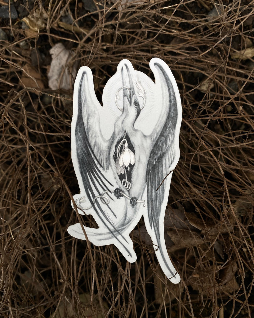 Small matte sticker with a graphite drawing of a white tern with a holographic snowdrop flower in its chest.