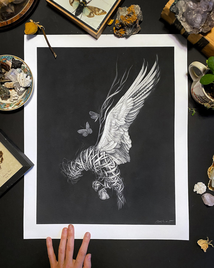 Art print of a graphite drawing of a bird made of braided grass and moth wings on a black background.