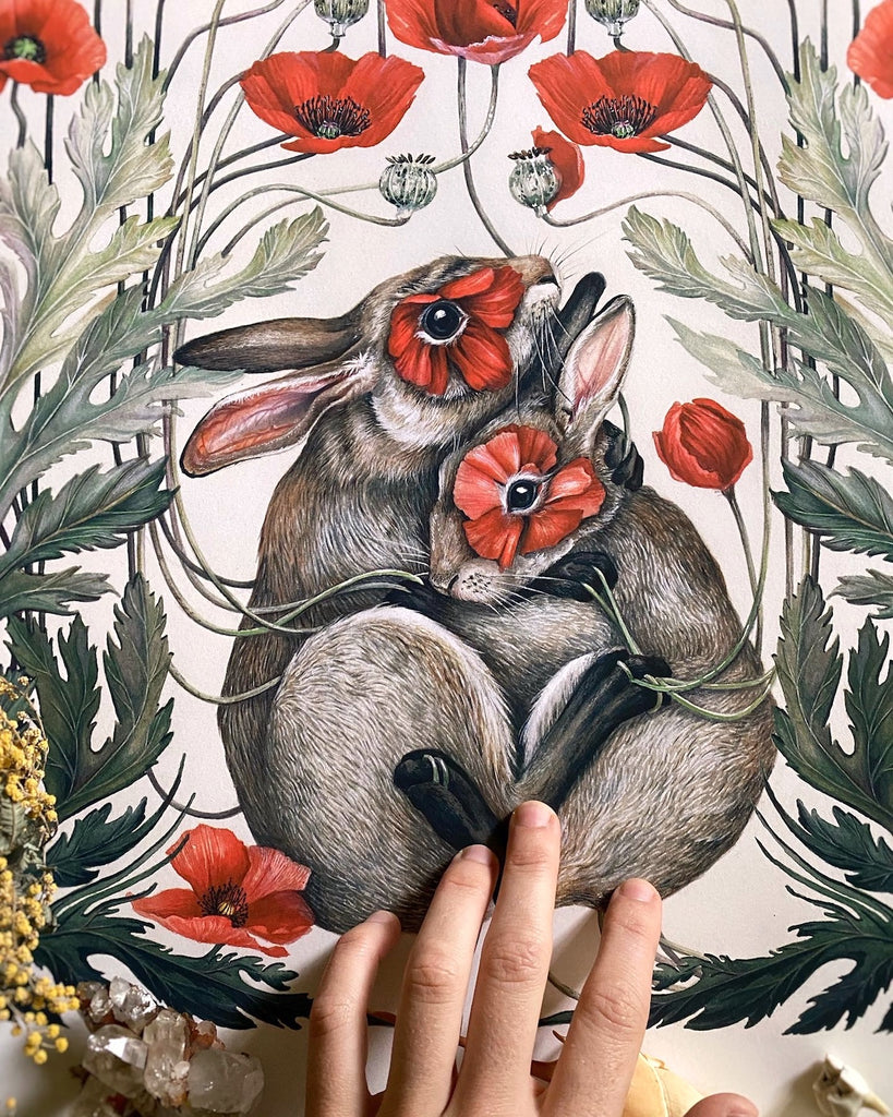 Art print of two brown rabbits embracing, surrounded by red California poppies.