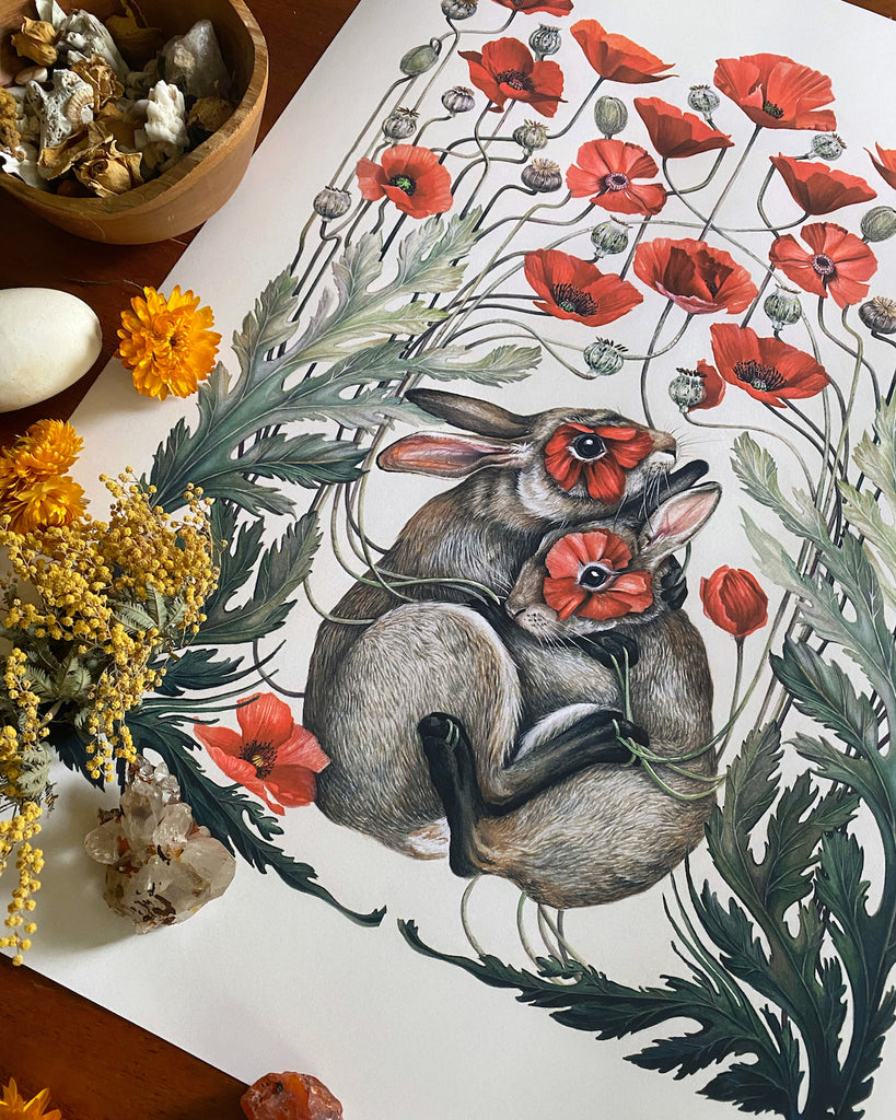 Art print of two brown rabbits embracing, surrounded by red California poppies.